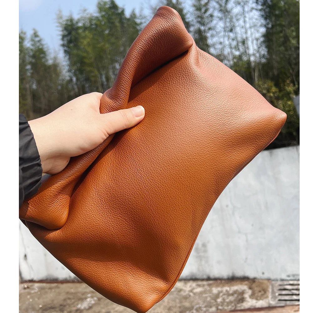 Bolso de mano de piel de vaca 100% auténtica para mujer, bolso de diseñador plegable, bolso con asa magnética Simple
