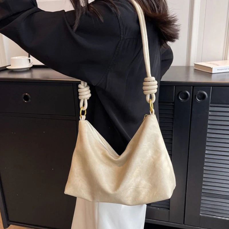 Nuevo bolso de mujer a la moda, textura de cuero suave de alta gama, bolso de un solo hombro, bolso cruzado para mujer, hombro ancho geométrico