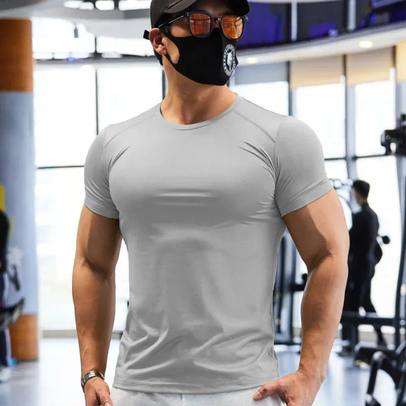 Camiseta de gimnasio para hombre de talla grande, camisetas deportivas de ajuste seco para hombre, sudadera, Tops de Color liso, ropa deportiva para entrenamiento muscular, ropa de Yoga