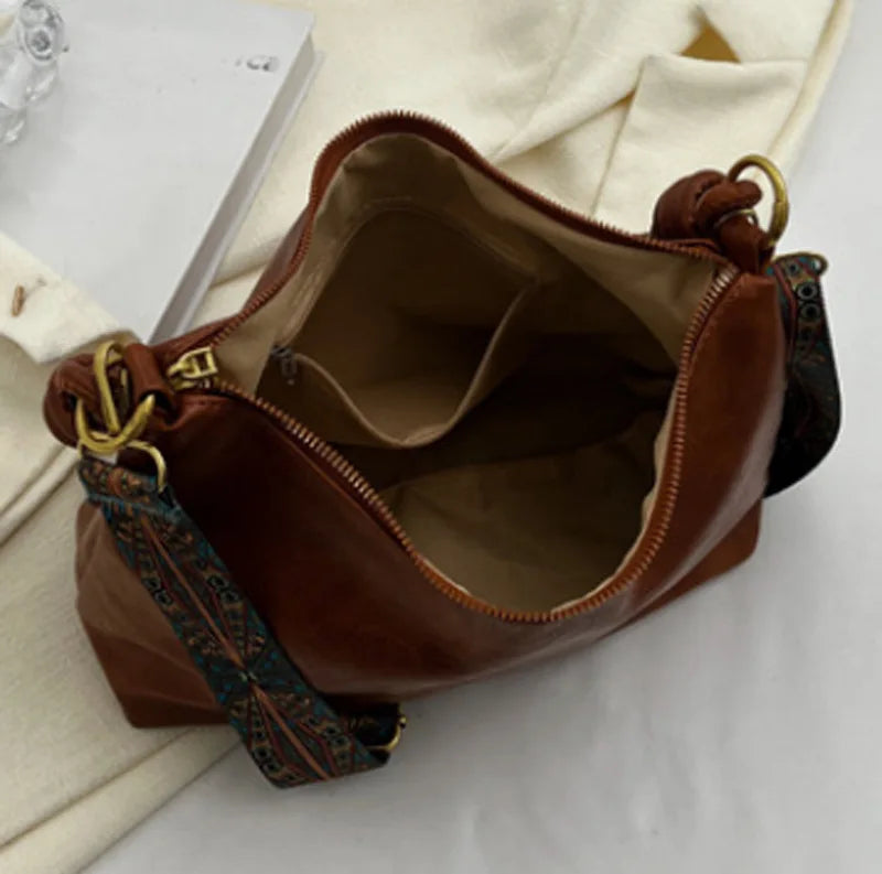 Nuevo bolso de mujer a la moda, textura de cuero suave de alta gama, bolso de un solo hombro, bolso cruzado para mujer, hombro ancho geométrico