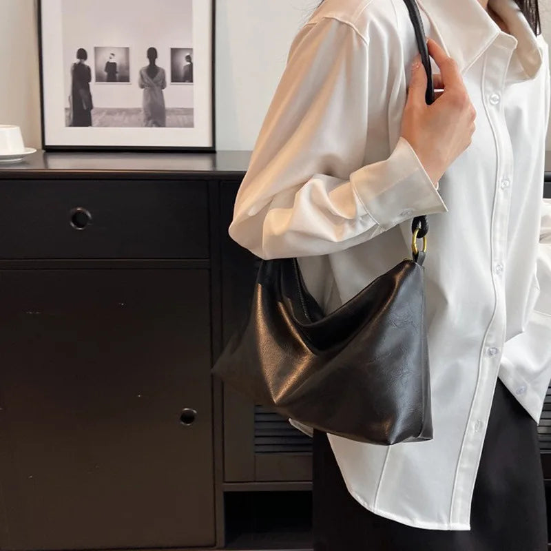 Nuevo bolso de mujer a la moda, textura de cuero suave de alta gama, bolso de un solo hombro, bolso cruzado para mujer, hombro ancho geométrico