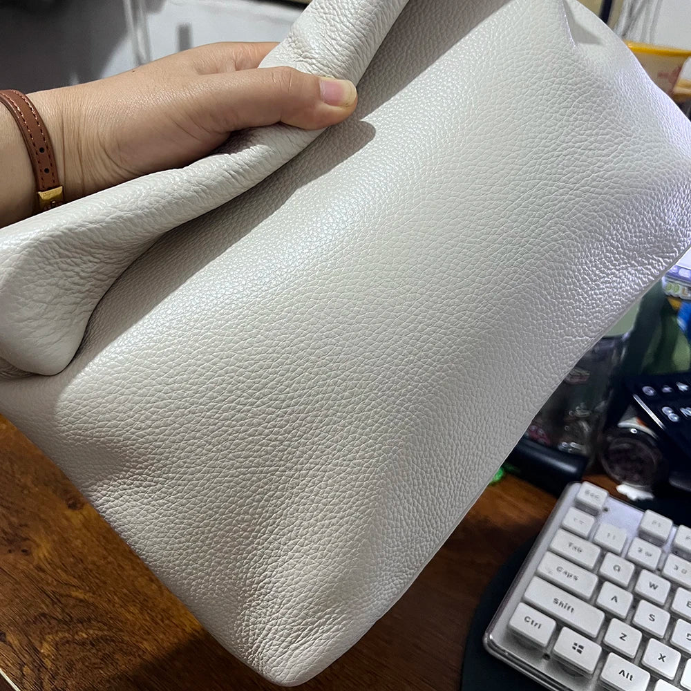 Bolso de mano de piel de vaca 100% auténtica para mujer, bolso de diseñador plegable, bolso con asa magnética Simple