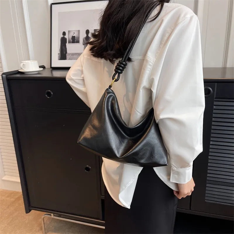 Nuevo bolso de mujer a la moda, textura de cuero suave de alta gama, bolso de un solo hombro, bolso cruzado para mujer, hombro ancho geométrico