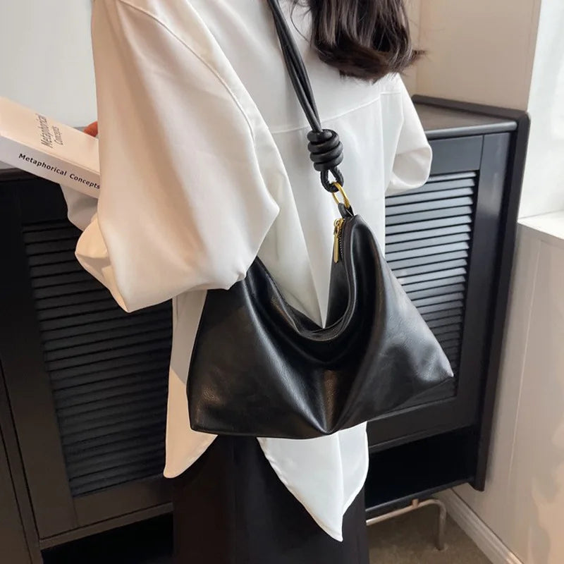 Nuevo bolso de mujer a la moda, textura de cuero suave de alta gama, bolso de un solo hombro, bolso cruzado para mujer, hombro ancho geométrico