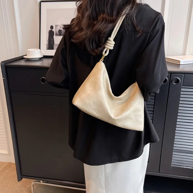 Nuevo bolso de mujer a la moda, textura de cuero suave de alta gama, bolso de un solo hombro, bolso cruzado para mujer, hombro ancho geométrico