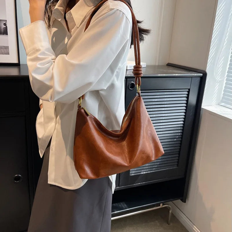 Nuevo bolso de mujer a la moda, textura de cuero suave de alta gama, bolso de un solo hombro, bolso cruzado para mujer, hombro ancho geométrico