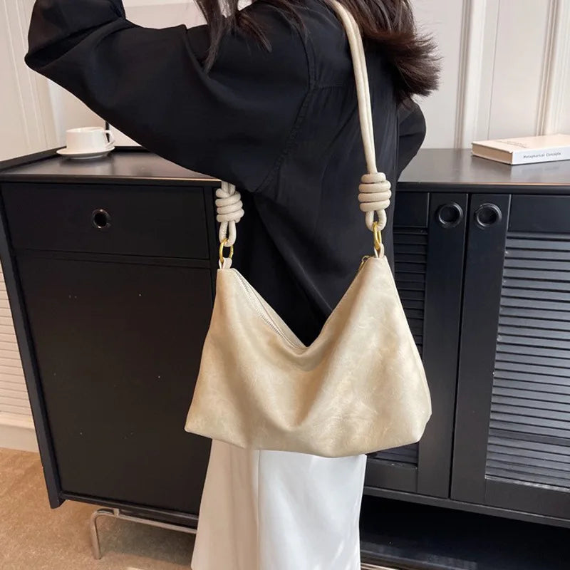 Nuevo bolso de mujer a la moda, textura de cuero suave de alta gama, bolso de un solo hombro, bolso cruzado para mujer, hombro ancho geométrico