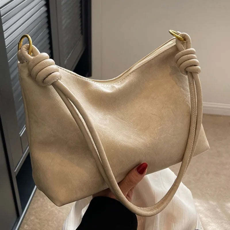 Nuevo bolso de mujer a la moda, textura de cuero suave de alta gama, bolso de un solo hombro, bolso cruzado para mujer, hombro ancho geométrico