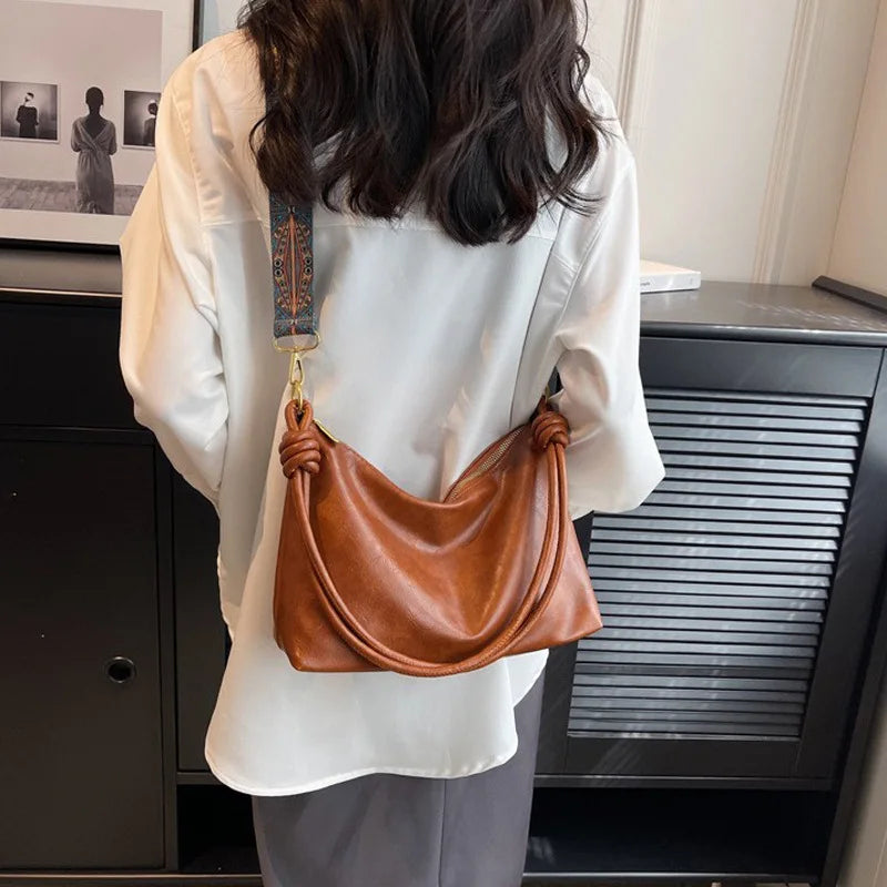 Nuevo bolso de mujer a la moda, textura de cuero suave de alta gama, bolso de un solo hombro, bolso cruzado para mujer, hombro ancho geométrico