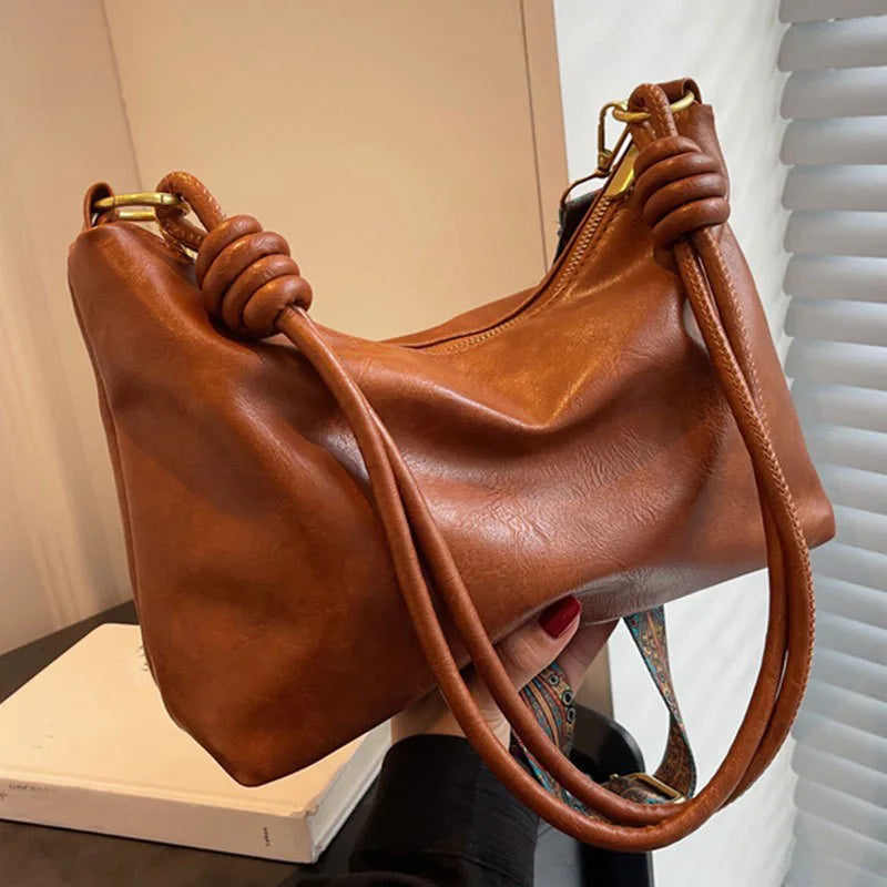 Nuevo bolso de mujer a la moda, textura de cuero suave de alta gama, bolso de un solo hombro, bolso cruzado para mujer, hombro ancho geométrico