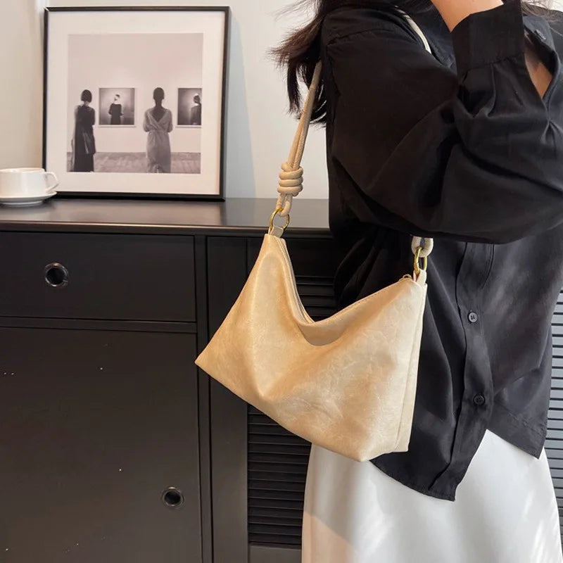 Nuevo bolso de mujer a la moda, textura de cuero suave de alta gama, bolso de un solo hombro, bolso cruzado para mujer, hombro ancho geométrico